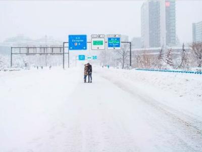 'Lovers of the A-2' identified: Couple snapped kissing in the snow given free trip to Paris