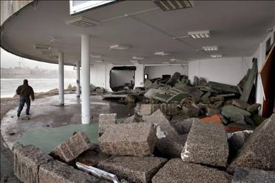 Coastal storms claim first life