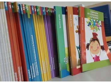 Textbooks to be bought by schools and lent free to pupils, saving parents hundreds
