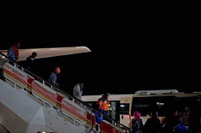 First refugees touch down in Spain