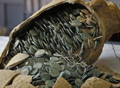 Builders find 600 kilos of freshly-minted Roman coins worth millions of euros