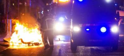 Barcelona police await fourth night of riots as ex-mayor quizzed for paying squatters' rent