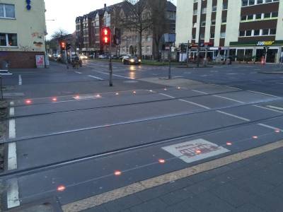 Tarmac 'traffic lights' for mobile addicts on pedestrian crossing