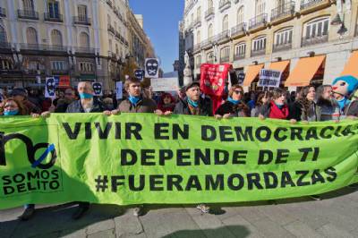 Amnesty International condemns 'gagging law': 34,000 fined for actions 'permitted by EU rules'