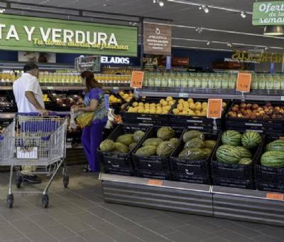 Spaniards shop less often but spend more and swap meat for fruit and veg