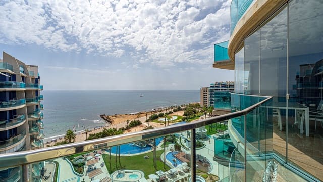 Apartamento de 2 habitaciones en Punta Prima, Orihuela en venta con piscina garaje - 450.000 € (Ref: 9972945)