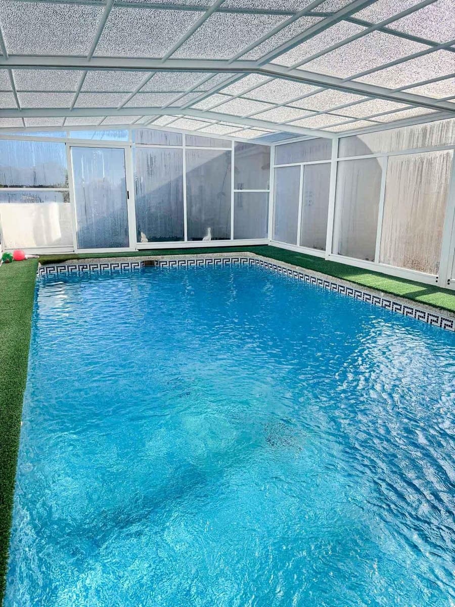 3 soverom Kjedet enebolig til salgs i Alfaz del Pi / L'Alfas del Pi med svømmebasseng garasje - € 460 000 (Ref: 9438550)