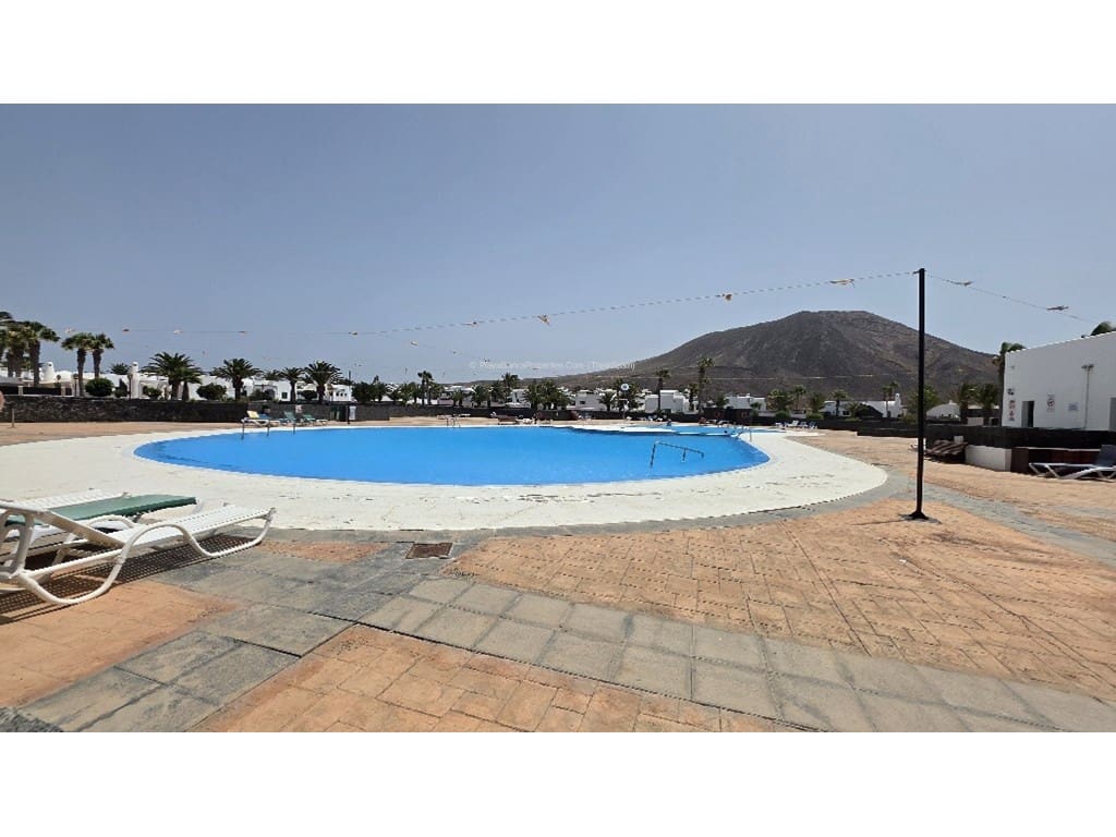 2 sypialnia Bungalow na sprzedaż w Playa Blanca z basenem - 385 000 € (Ref: 10008236)