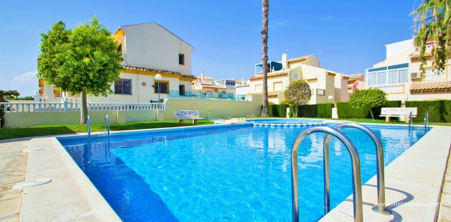 2 quarto Casa em Banda para venda em Playa Flamenca com piscina - 215 000 € (Ref: 9861102)