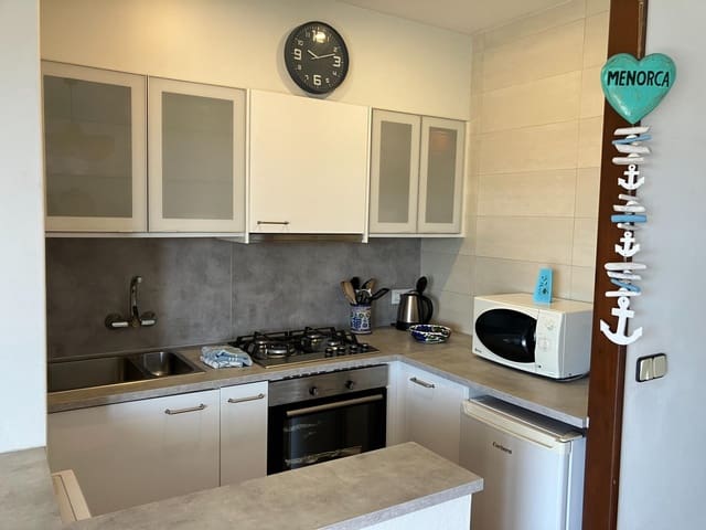 2 Zimmer Apartment zu verkaufen in Cala'n Porter, Alayor / Alaior mit Pool - 290.000 € (Ref: 9942477)