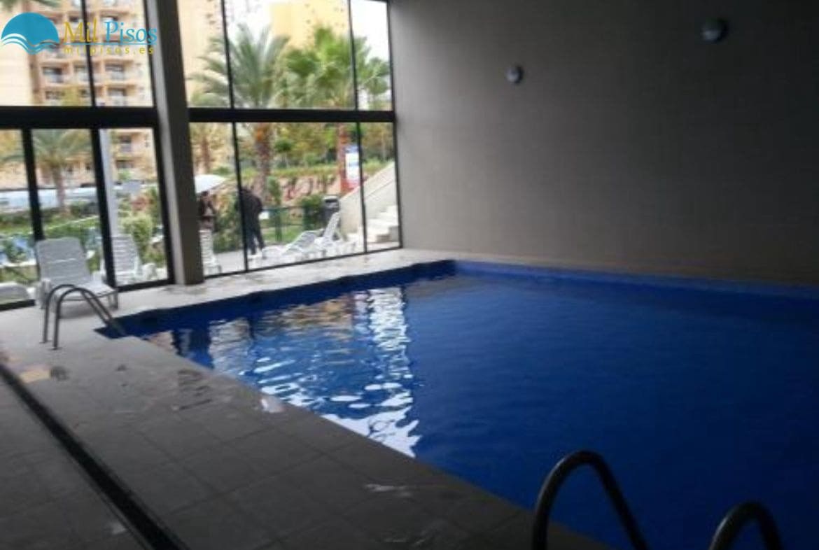 Apartamento de 1 habitación en Benidorm en venta con piscina garaje - 264.000 € (Ref: 7130065)