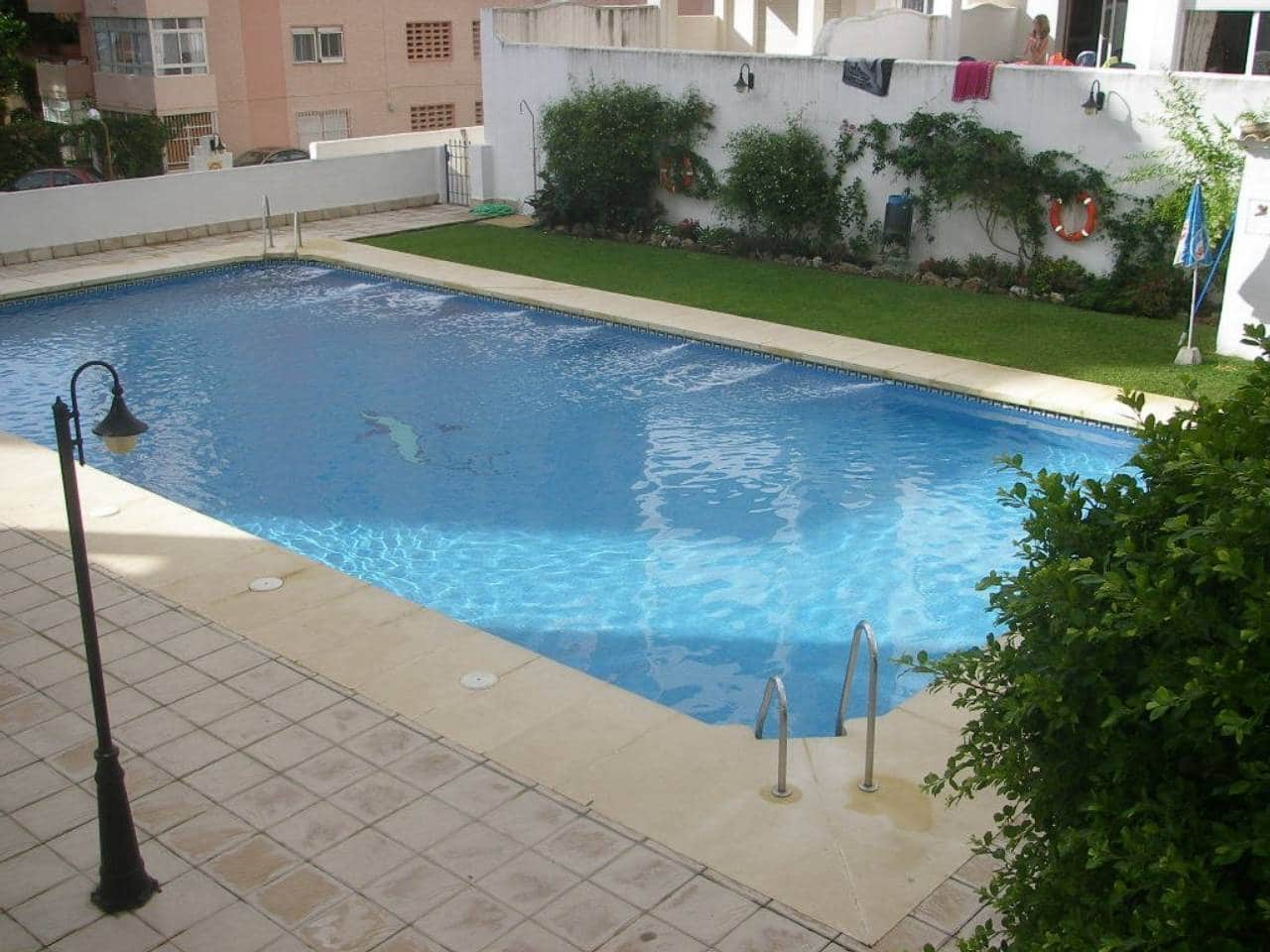 Apartamento de 2 habitaciones en Benalmádena en venta con piscina garaje - 395.000 € (Ref: 10094026)