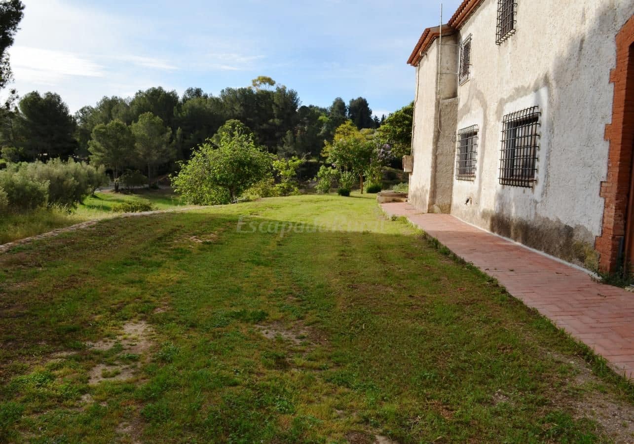 4 soveværelse Finca/Landehus til salg i El Catllar med swimmingpool garage - € 1.050.000 (Ref: 7563450)