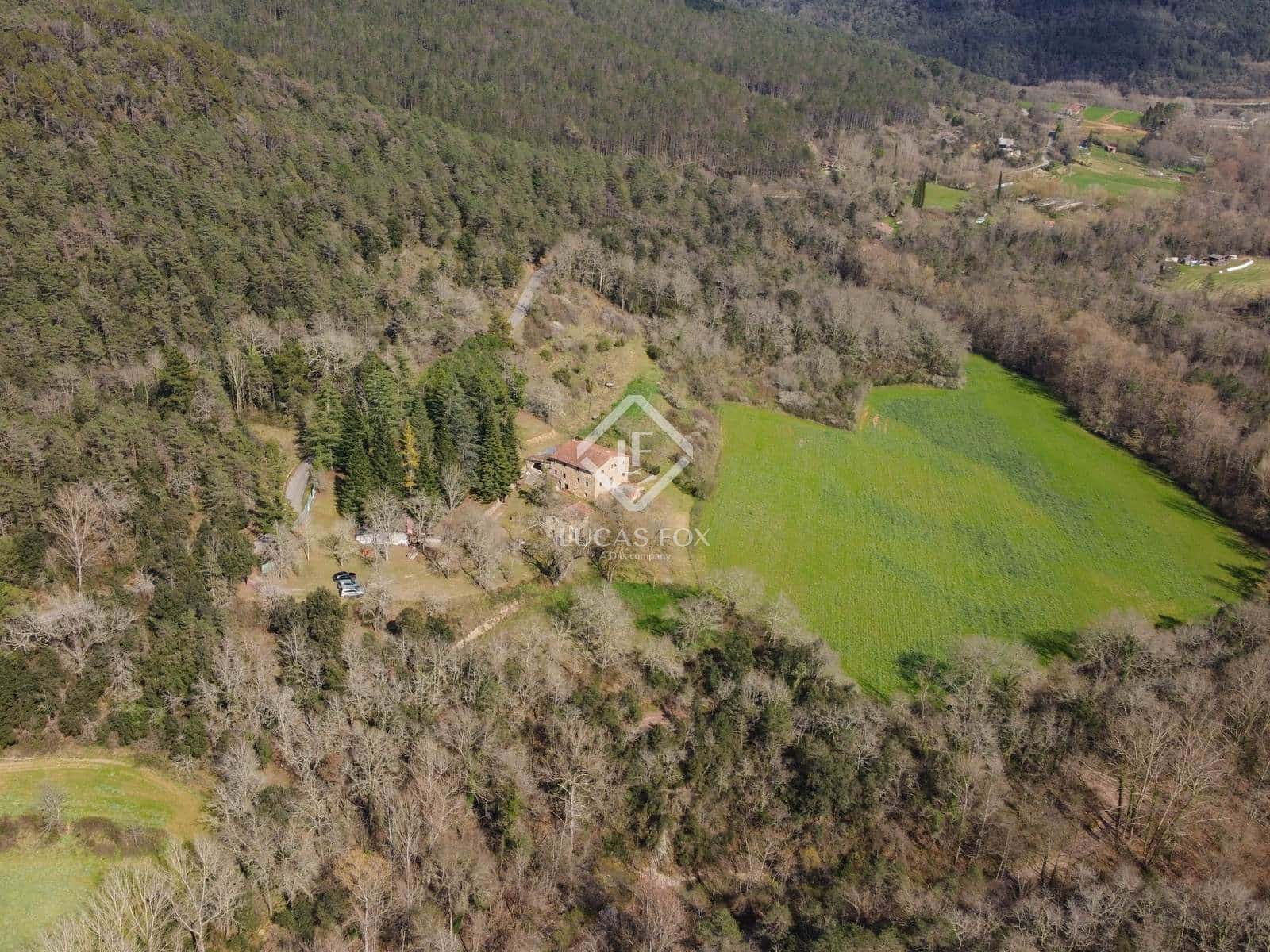 10 soveværelse Finca/Landehus til salg i La Vall del Bac med garage - € 800.000 (Ref: 9035517)