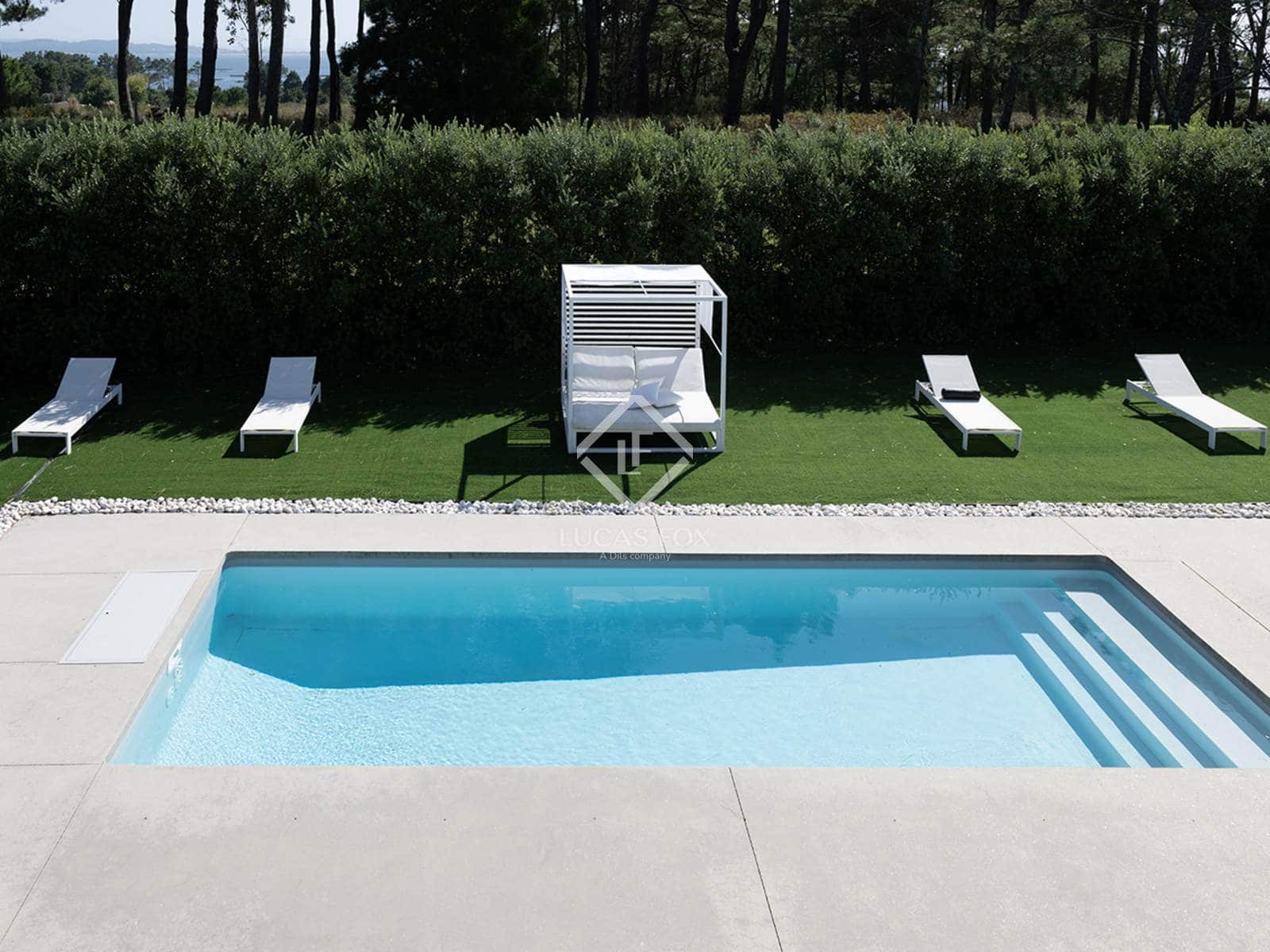 3 sypialnia Willa na sprzedaż w A Pobra do Caraminal z basenem garażem - 1 500 000 € (Ref: 9243520)