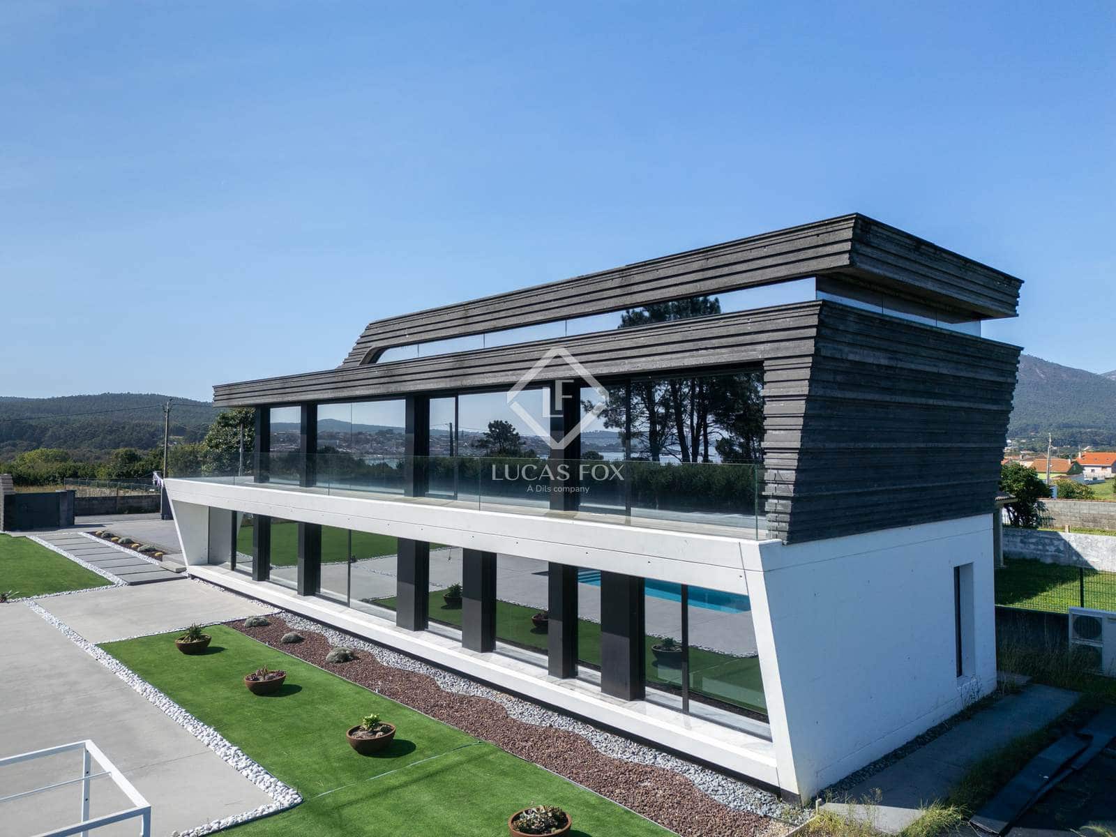 3 sypialnia Willa na sprzedaż w A Pobra do Caraminal z basenem garażem - 1 500 000 € (Ref: 9243520)