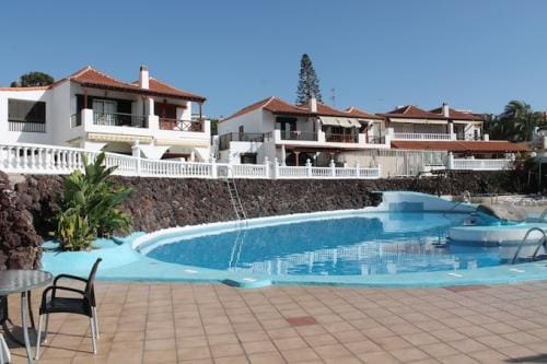 Estúdio para venda em Playa de las Americas com piscina - 279 000 € (Ref: 9799054)