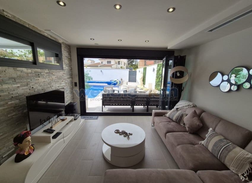 3 quarto Moradia Geminada para venda em Dehesa de Campoamor com piscina - 625 000 € (Ref: 9753526)