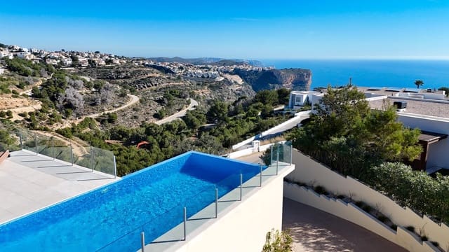 Chalet de 4 habitaciones en Cumbre del Sol, Benitachell / Benitatxell en venta con piscina garaje - 1.429.000 € (Ref: 8366525)