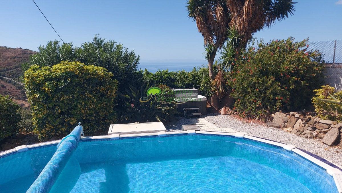 3 sypialnia Finka/Dom wiejski na sprzedaż w Torrox z basenem garażem - 429 000 € (Ref: 10146332)