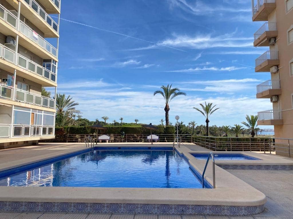 1 quarto Apartamento para arrendar em Punta Prima com piscina garagem - 650 € (Ref: 7546810)