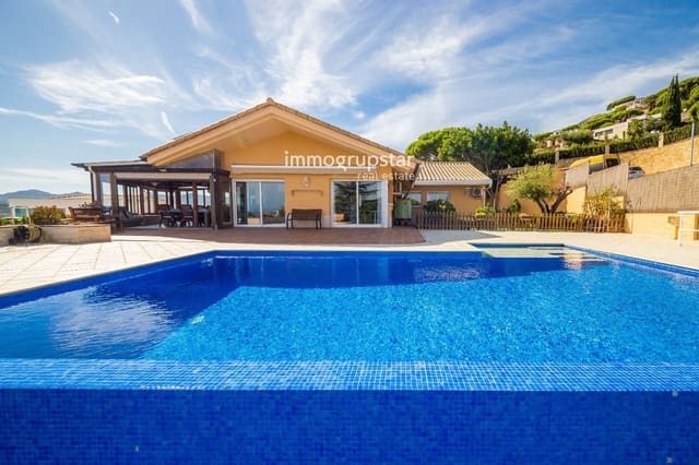 4 chambre Villa/Maison à vendre à Castell d'Aro, Castell-Platja d'Aro avec piscine garage - 995 000 € (Ref: 10114649)