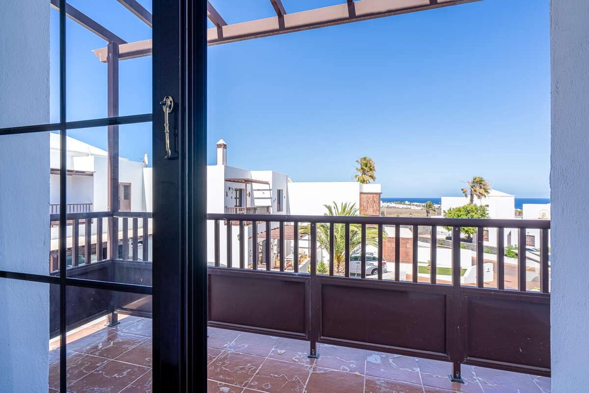 2 quarto Moradia Geminada para venda em Costa Teguise com piscina garagem - 375 000 € (Ref: 10020018)