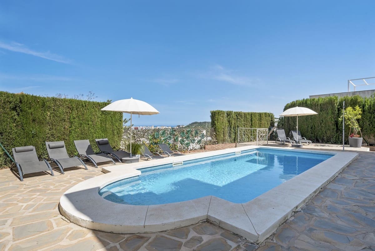 5 Zimmer Villa zu verkaufen in Mijas Costa mit Pool Garage - 995.000 € (Ref: 9809466)