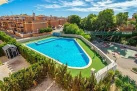 2 sypialnia Bungalow na sprzedaż w Playa Flamenca z basenem garażem - 129 000 € (Ref: 9771836)