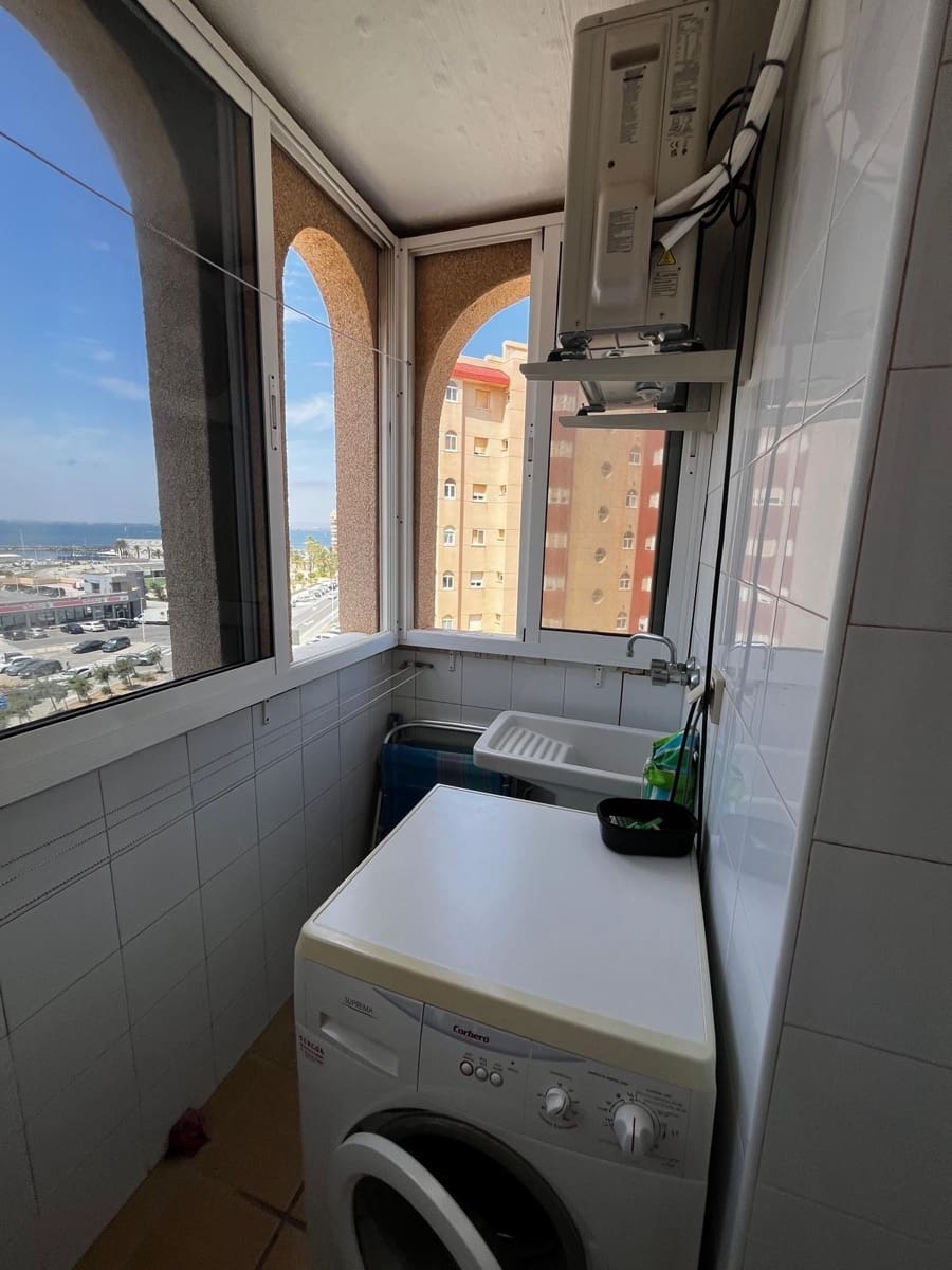 Piso de 2 habitaciones en La Manga del Mar Menor en venta con piscina garaje - 189.000 € (Ref: 10017526)