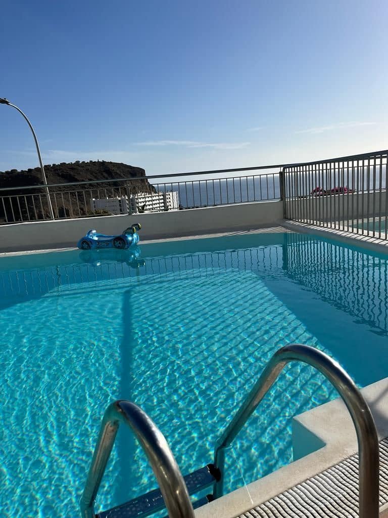   1 soveværelse   ferieLejlighed i Puerto Rico   med   swimmingpool  garage  - € 560 (Ref: 6902232)