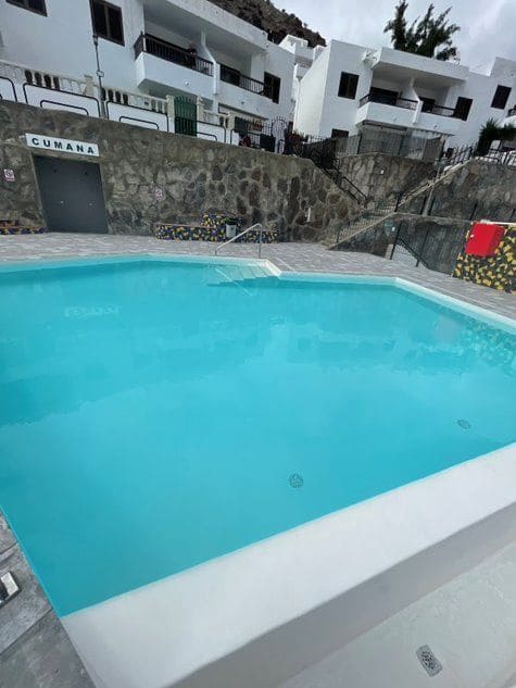 1 sovrum Lägenhet för semesterbostäder i Puerto Rico med pool garage - 630 € (Ref: 8289102)