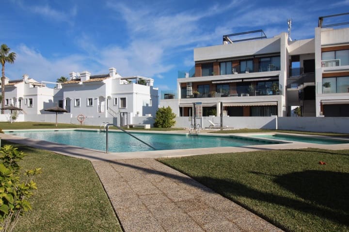 2 bedroom Semi-detached Villa for sale in Cabo Roig with pool - € 329,000 (Ref: 9448853)