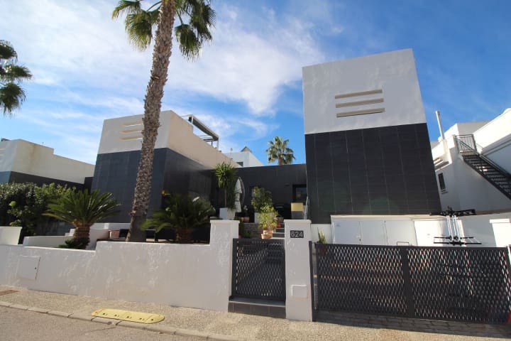 2 bedroom Semi-detached Villa for sale in Cabo Roig with pool - € 329,000 (Ref: 9448853)