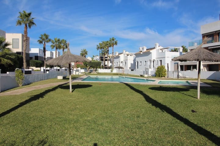 2 bedroom Semi-detached Villa for sale in Cabo Roig with pool - € 329,000 (Ref: 9448853)