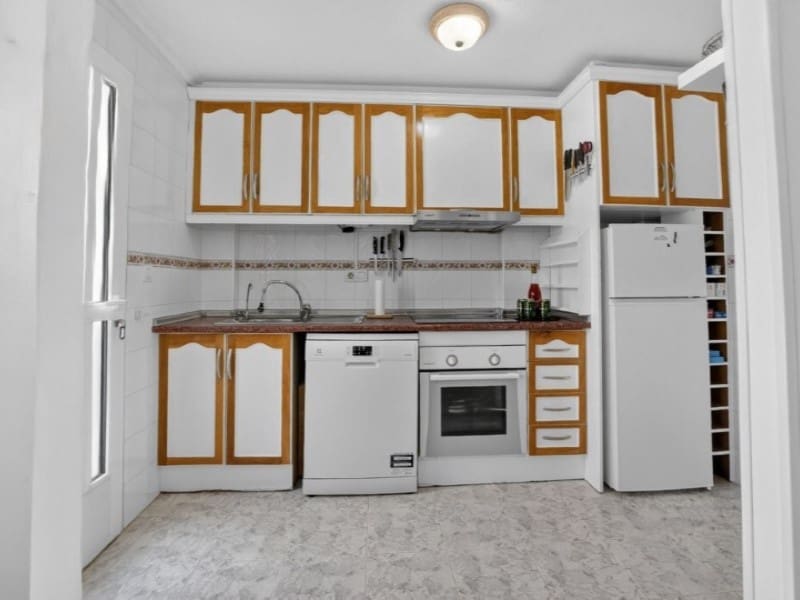 2 quarto Casa em Banda para venda em Torrevieja com piscina - 219 000 € (Ref: 9904302)