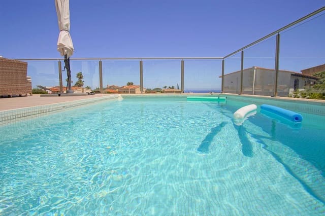 Chalet de 4 habitaciones en Cumbre del Sol, Benitachell / Benitatxell en venta con piscina garaje - 950.000 € (Ref: 9997496)