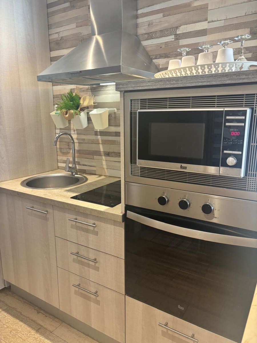 Apartamento de 1 habitación en Playa de las Americas en venta con piscina garaje - 370.000 € (Ref: 9378494)