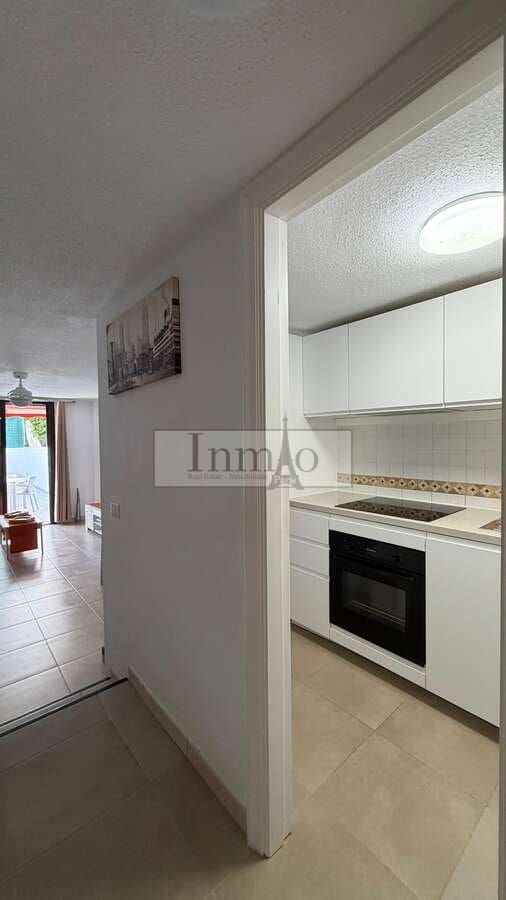 2 bedroom Semi-detached Villa for rent in Playa de las Americas with pool - € 1,600 (Ref: 9770194)
