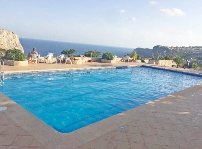 4 soveværelse Semi-Rækkehus til salg i Cumbre del Sol med swimmingpool garage - € 450.000 (Ref: 8424891)