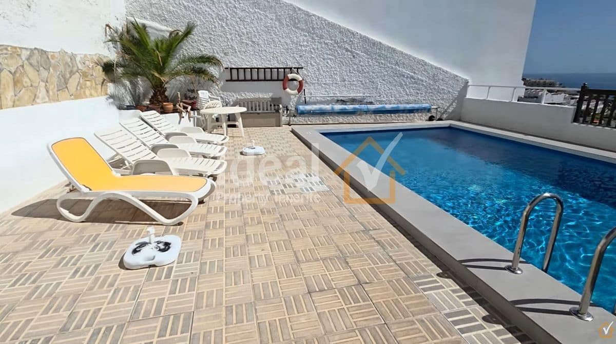 2 sypialnia Dom blizniak na sprzedaż w Los Gigantes z basenem garażem - 495 000 € (Ref: 9893685)