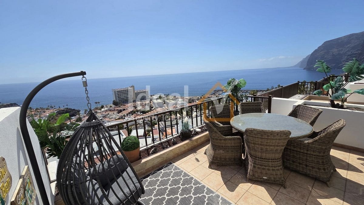 2 sypialnia Dom blizniak na sprzedaż w Los Gigantes z basenem garażem - 495 000 € (Ref: 9893685)