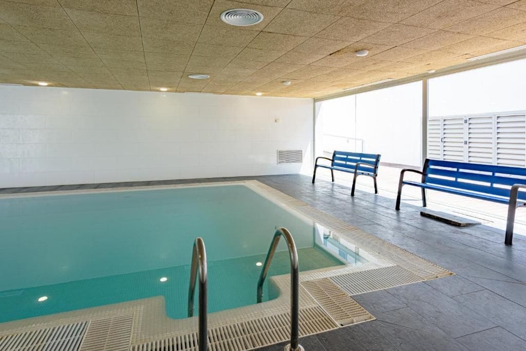 Apartamento de 3 habitaciones en Manilva en venta con piscina garaje - 345.000 € (Ref: 9898684)