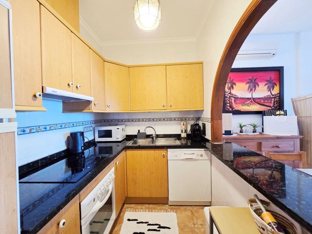 Appartement de 2 chambres à louer à Benitachell / Benitatxell avec piscine garage - 850 € (Ref: 9827296)