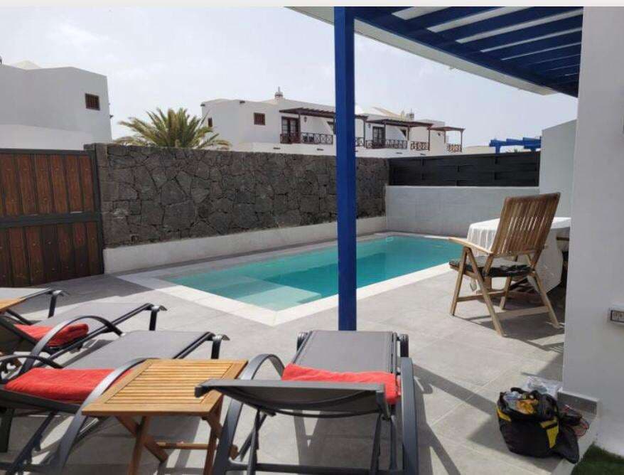 3 bedroom Semi-detached Villa for sale in Playa Blanca with pool - € 426,000 (Ref: 9280688)