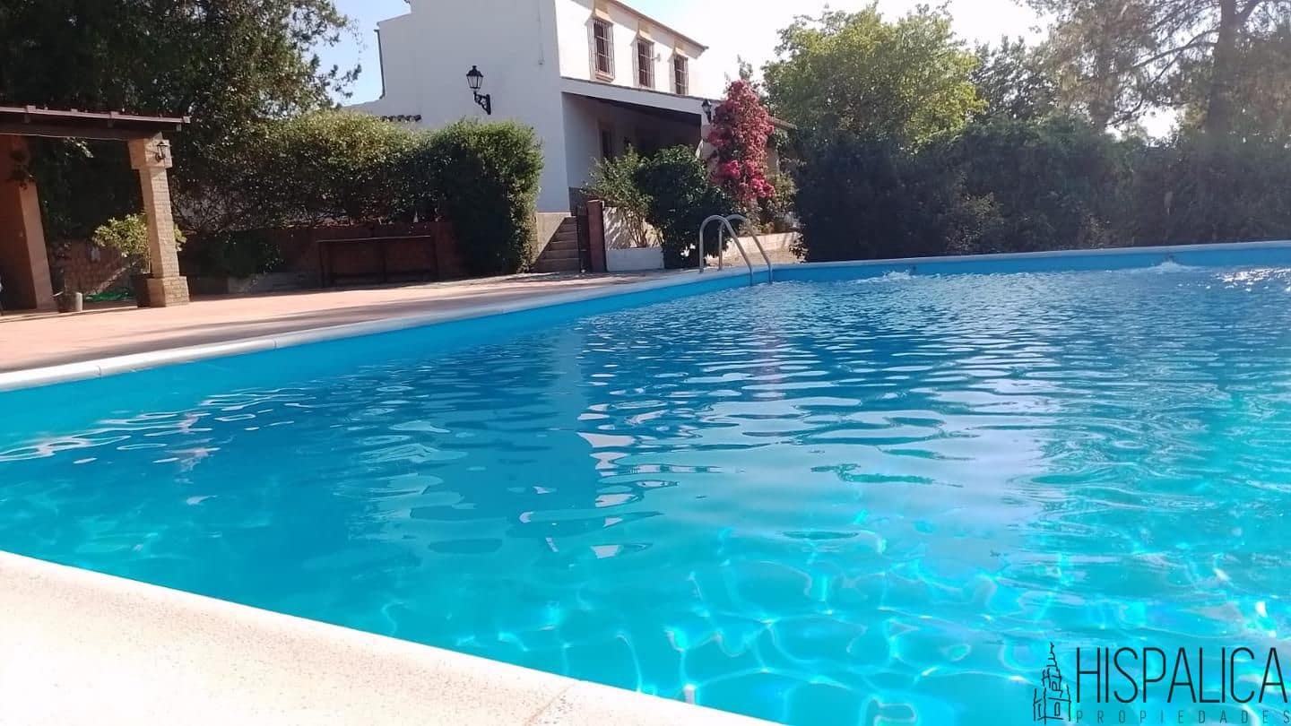 5 soveværelse Finca/Landehus til salg i Lora del Rio med swimmingpool - € 675.000 (Ref: 9135938)