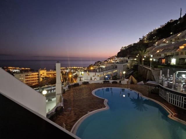 Piso en Puerto Rico, Mogán en venta con piscina garaje - 130.000 € (Ref: 9610337)