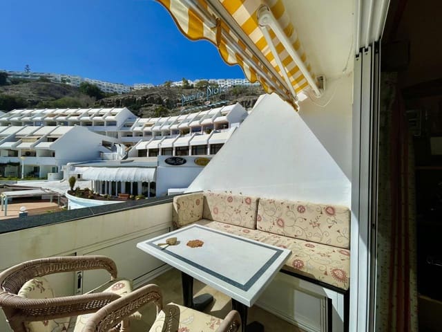 Piso en Puerto Rico, Mogán en venta con piscina garaje - 130.000 € (Ref: 9610337)