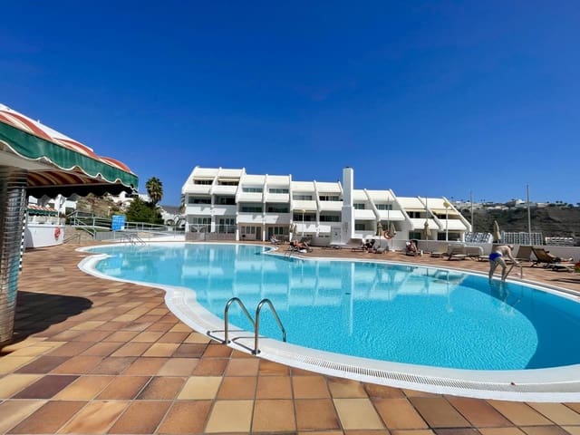 Piso en Puerto Rico, Mogán en venta con piscina garaje - 130.000 € (Ref: 9610337)