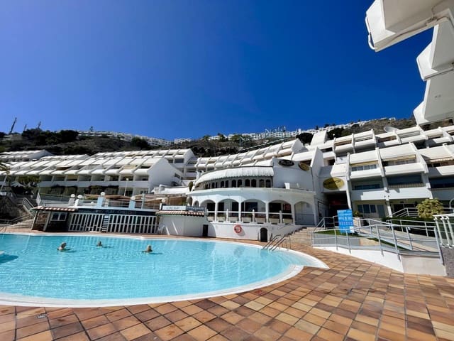 Piso en Puerto Rico, Mogán en venta con piscina garaje - 130.000 € (Ref: 9610337)